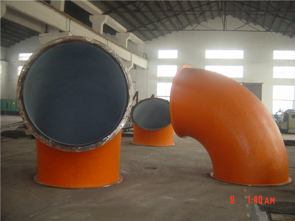 Wear-resistant pipe fittings